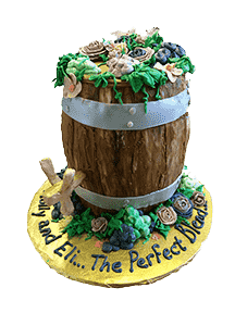 engagement cake with flowers on a barrel