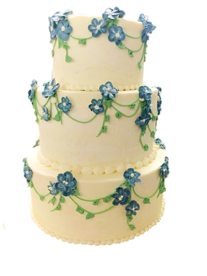 three-tier cake with colorful flowers